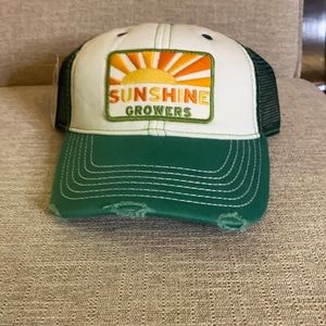 NWT sunshine growers Fossil hat.